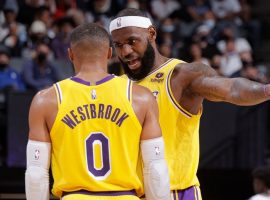LeBron James from the LA Lakers reminding teammate Russell Westbrook that he missed another defensive assignment. (Image: Getty)