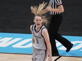 Paige Bueckers, guard from UConn, celebrates a big shot in the 2022 March Madness Women’s Basketball Tournament. (Image: Susannah Greenburg/Getty)