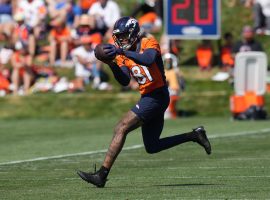 Tim Patrick from the Denver Broncos catches a pass from Russell Wilson in training camp before his knee injury. (Image: Getty)