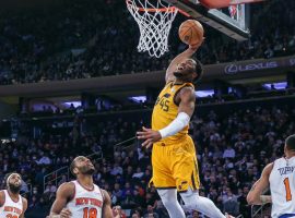 Donovan Mitchell from the Utah Jazz throws down a dunk against the New York Knicks. (Image: Getty)